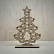 Load image into Gallery viewer, Freestanding MDF Christmas tree Advent calendar on a wooden background.
