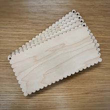 Load image into Gallery viewer, A stack of five blank laser cut rectangular scalloped plaques with rounded corners and two holes in the top corners, displayed on a wooden surface.