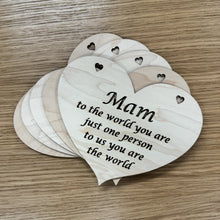 Load image into Gallery viewer, A stack of five heart shaped laser cut plaques with the following phrase cut out: "Mam, to the world you are just one person, to us you are the world". The word, "Mam" is larger like in a title case text.