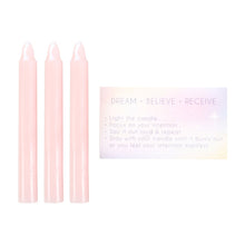 Load image into Gallery viewer, Set of three pink candles with an instruction spell card on a white background.