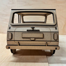 Load image into Gallery viewer, The back of a 3D MDF laser cut cupcake stand in the shape of a classic mini car. Item has layered lights, bumpers, logo and other parts. Item on a light wooden background.