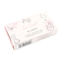 Load image into Gallery viewer, A Love Spell in a box kit. with witchy themed illustrations on the cover and a barcode on the side. Item on a white background.