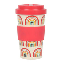 Load image into Gallery viewer, A reusable travel tumbler with a cream-coloured body printed with colourful rainbow patterns, a bright red lid and a matching red silicone grip band in the middle. Item on a white background.
