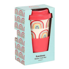 Load image into Gallery viewer, A bamboo travel mug with a red lid and red grip, featuring a colourful rainbow pattern on a cream background, presented inside its light blue packaging box with a matching rainbow pattern on the side.