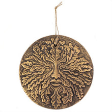 Load image into Gallery viewer, A terracotta plaque with a Green Man design. The plaques have a copper effect and string loop for hanging.
