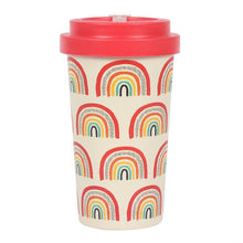 Load image into Gallery viewer, A reusable travel tumbler with a cream-coloured body printed with colourful rainbow patterns, a bright red lid. The matching red grip band is not in this image. Item on a white background.