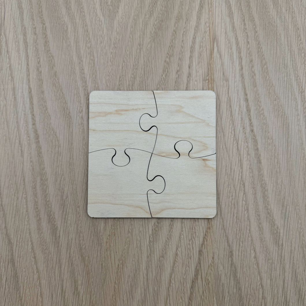 A blank laser cut puzzle. Two by two pieces. A total of four pieces.