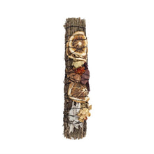 Load image into Gallery viewer, A ritual smudging wand with Red Jasper stone, Rosemary and Palo Santo.
Decorated with dried orange slices and purple flowers, hand tied with an orange thread.
