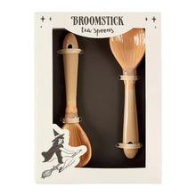 Load image into Gallery viewer, Broomstick tea spoons in a cardboard box with witch illustration on the packaging.
