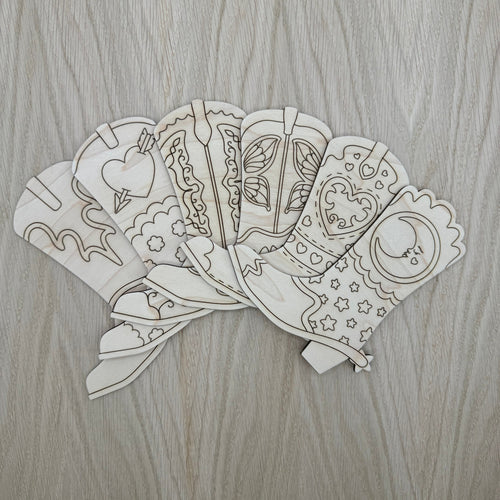 A set of laser cut cowboy boots in six different styles