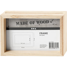 Load image into Gallery viewer, A double sided pine photo frame on a white background. The label inside the frame shows the dimensions in a diagram, along with the manufacturer info and barcode. A slot is visible at the top where the photo or flat items will be inserted into the frame.
