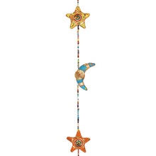 Load image into Gallery viewer, Decorative fabric hanging with star and moon shapes on a white background.
