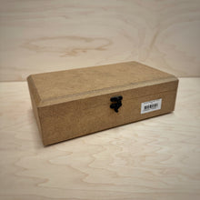 Load image into Gallery viewer, A rectangular MDF jewellery box with a small black metal clasp, a hinged bevelled lid and a white barcode label, set on a light wood grain surface.
