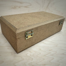 Load image into Gallery viewer, The back of a rectangular MDF jewellery box with two metal hinges, and a hinged bevelled lid, set on a light wood grain surface.
