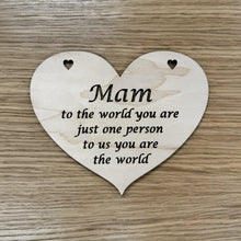 Load image into Gallery viewer, A heart shaped laser cut plaque with the following phrase cut out: "Mam, to the world you are just one person, to us you are the world". The word, "Mam" is larger like in a title case text.
