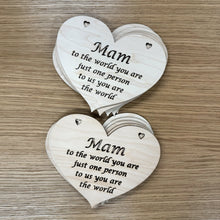 Load image into Gallery viewer, Two stacks of five heart shaped laser cut plaques with the following phrase cut out: "Mam, to the world you are just one person, to us you are the world". The word, "Mam" is larger like in a title case text. Sold as a set of ten.
