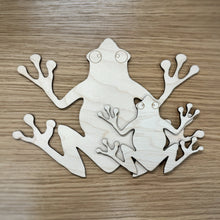 Load image into Gallery viewer, Two laser cut frog shapes showing both sizes available.
