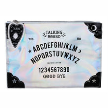 Load image into Gallery viewer, An iridescent makeup pouch with a spirit board design and a planchette zipper tag. Item has moons and stars on black scalloped corners and in the centre the item features the full alphabet, numbers 1 through 9 plus a 0; along with Yes, No and Good Bye to mimic a spirit board.
