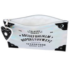 Load image into Gallery viewer, An opened iridescent makeup pouch with a spirit board design and a planchette zipper tag. Item has moons and stars on black scalloped corners and in the centre the item features the full alphabet, numbers 1 through 9 plus a 0; along with Yes, No and Good Bye to mimic a spirit board. Item on a white background.
