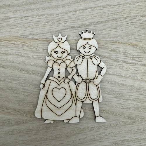 A wooden laser cut of a cute prince and princess linking arms, in an illustrative style