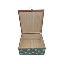 Load image into Gallery viewer, An open box for a pet's Christmas eve. The red lid can be seen on the edges but the inside of the box is an unpainted wood. The bottom of the box is green with a white paw print pattern. Item on a white background.
